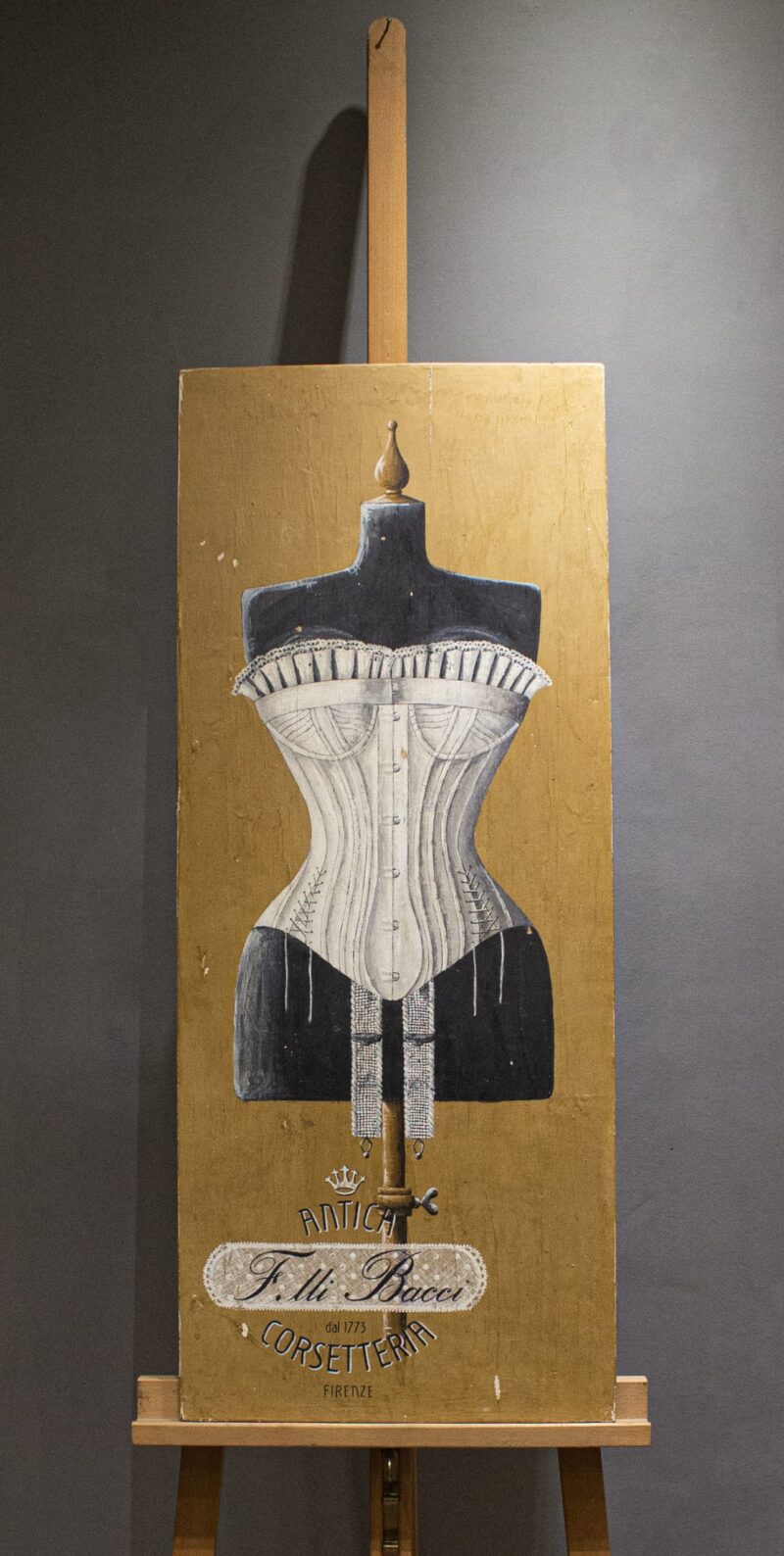 Corset with pearls painting on antique wood panel. Historic florentine corsetry shop's advertising. Tempera with natural pigments.