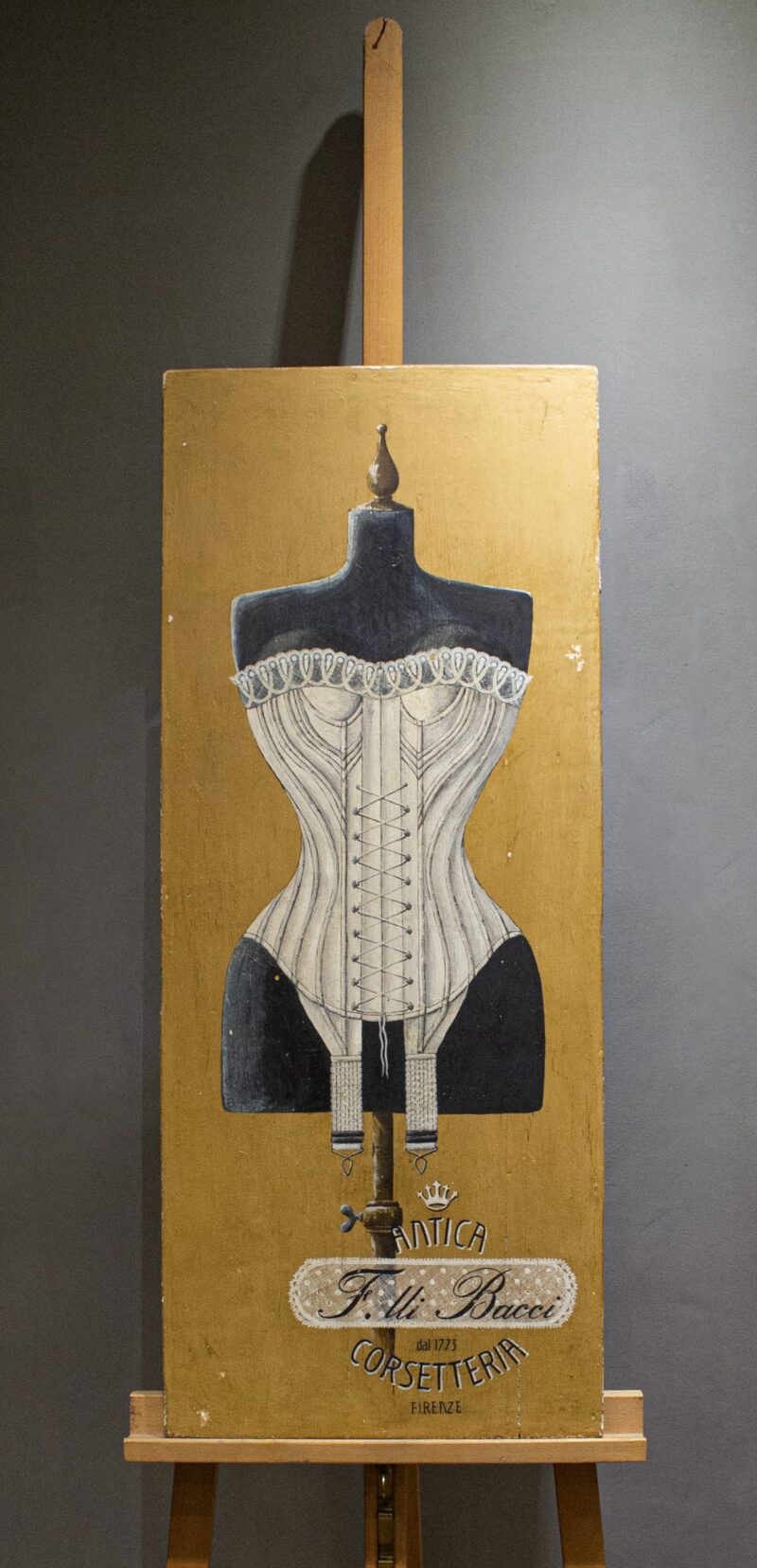 Corset painting on antique wood panel. Historic florentine corsetry shop's advertising. Tempera with natural pigments and rabbit glue.